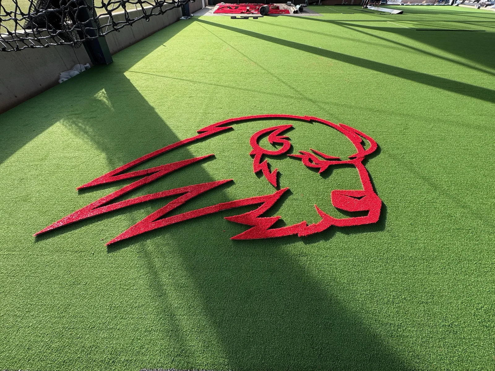 Trailblazer mascot logo inlaid into the green turf